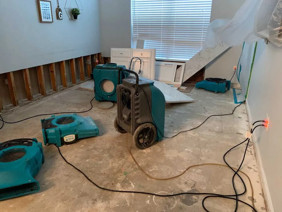 Dehumidifier in flood-cut room for Water Damage Restoration in Monmouth